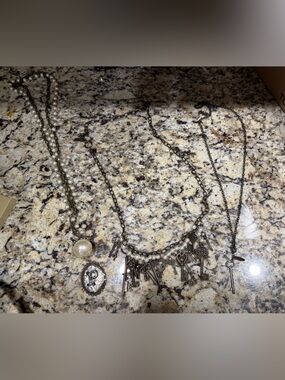 3 Plunder Necklaces All  are NEW 
#1 Initial P #2 single key #3 multiple keys
